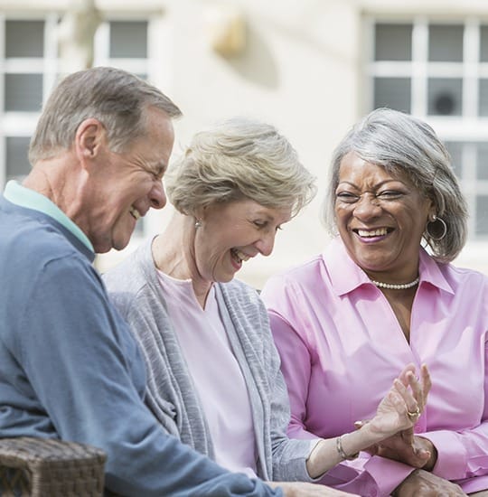 Laughing residents at our senior living facility in McMinnville