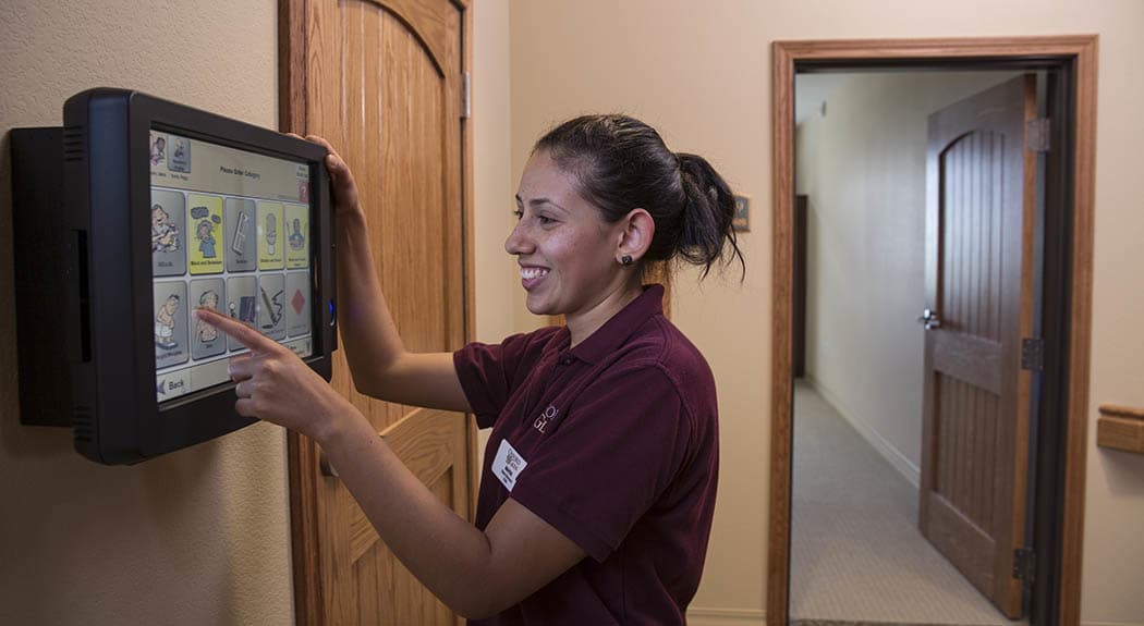 The Oxford Grand Assisted Living & Memory Care team member utilizing caretracker