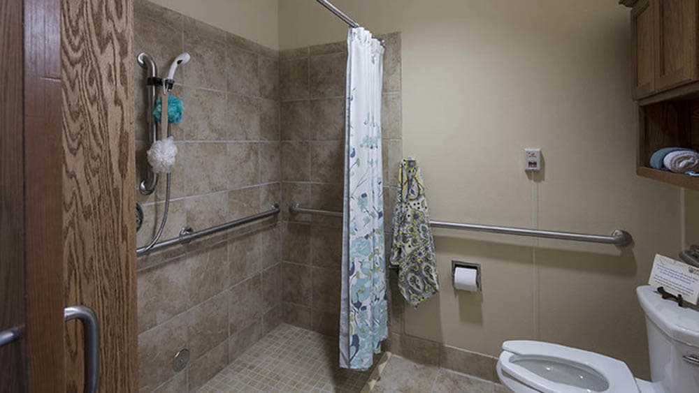 easy to access bathrooms at Oxford Glen Memory Care at Carrollton in Carrollton, Texas