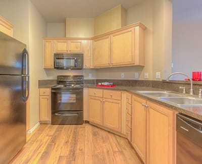 Modern kitchen in model apartment home at Bradley Park Apartments
