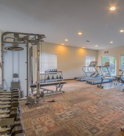 Well-equipped fitness center at Chestnut Hills Apartments