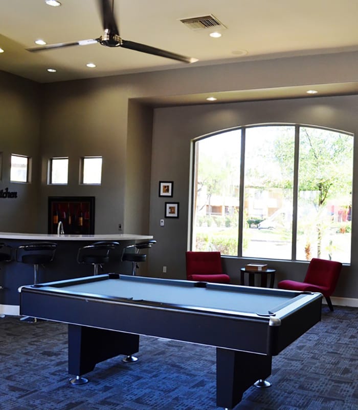 Clubhouse with billiards table at The Retreat Apartments
