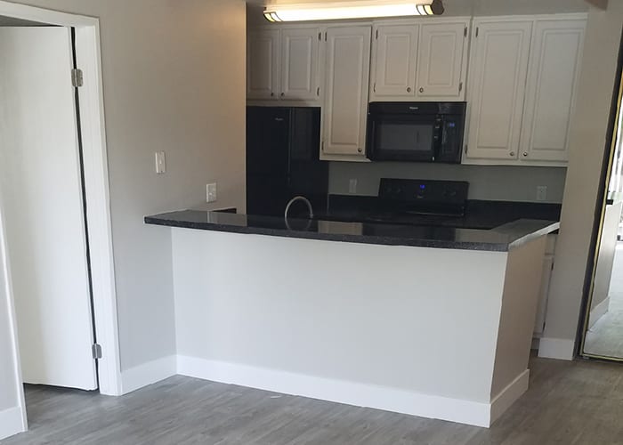Redesigned kitchen and hardwood floors at Presidio at Rancho Del Oro