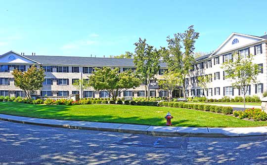 Gaze upon the green grass of Stanford Court Apartments