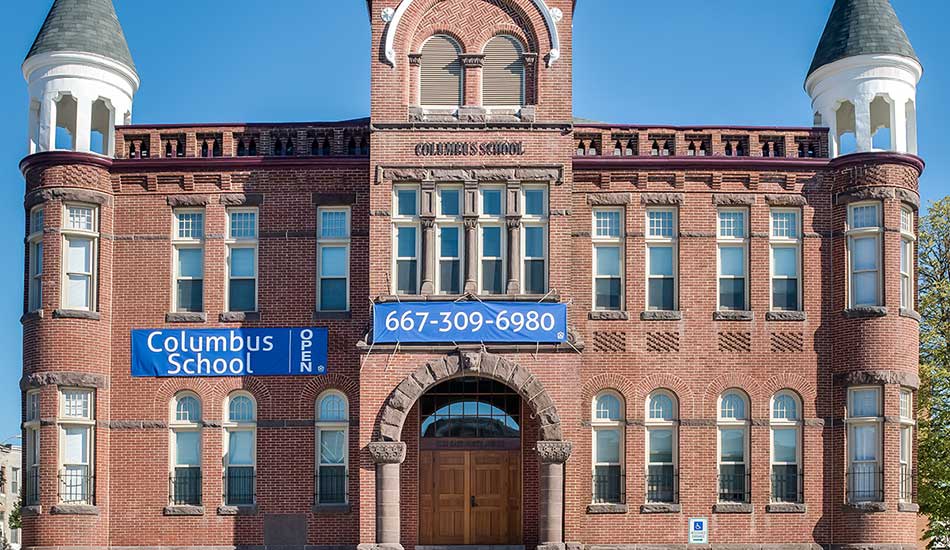 Columbus School Apartments front entrance in Baltimore