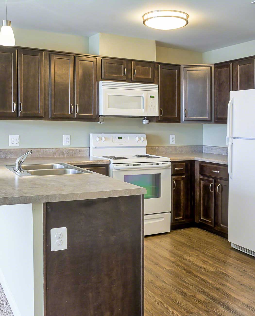 Kitchen with breakfast bar at Fulton Gethsemane Village