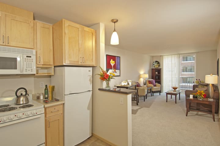 Model kitchen and living room at Gencare LifeStyle at Steel Lake in Federal Way, Washington