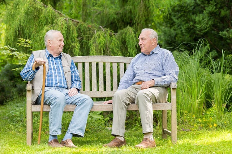 Two men sitting in garden in Murfreesboro, TN