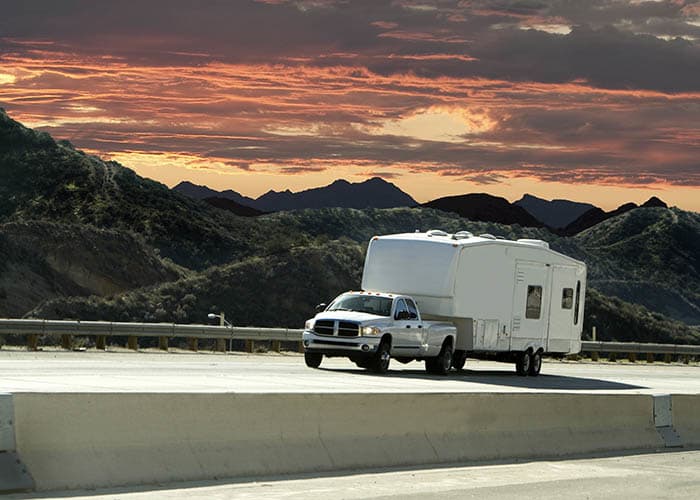 Truck pulling an RV near Superior Self Storage in Northern California