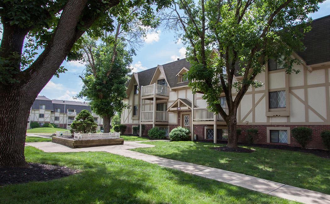 Beautifully maintained green spaces at Bavarian Woods in Middletown