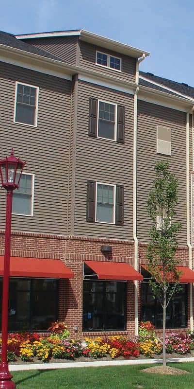 Front exterior view of apartments at Rochester Village Apartments at Park Place in Cranberry Township, PA