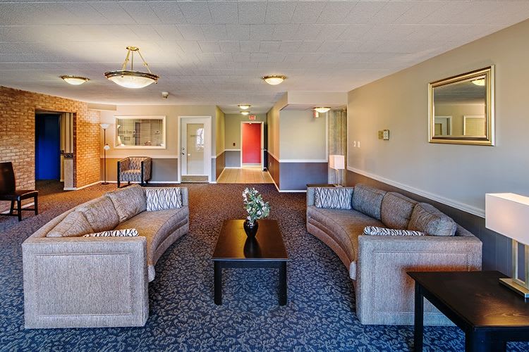 Clubhouse interior at Avalon Arms Apartments