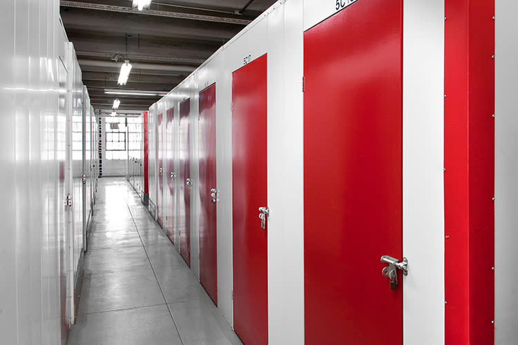 Red doors of units at CitiWide Self Storage in Long Island City, New York