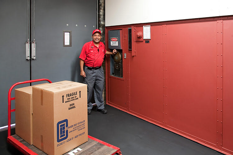 Man with dolly and moving boxes at CitiWide Self Storage in Long Island City, New York