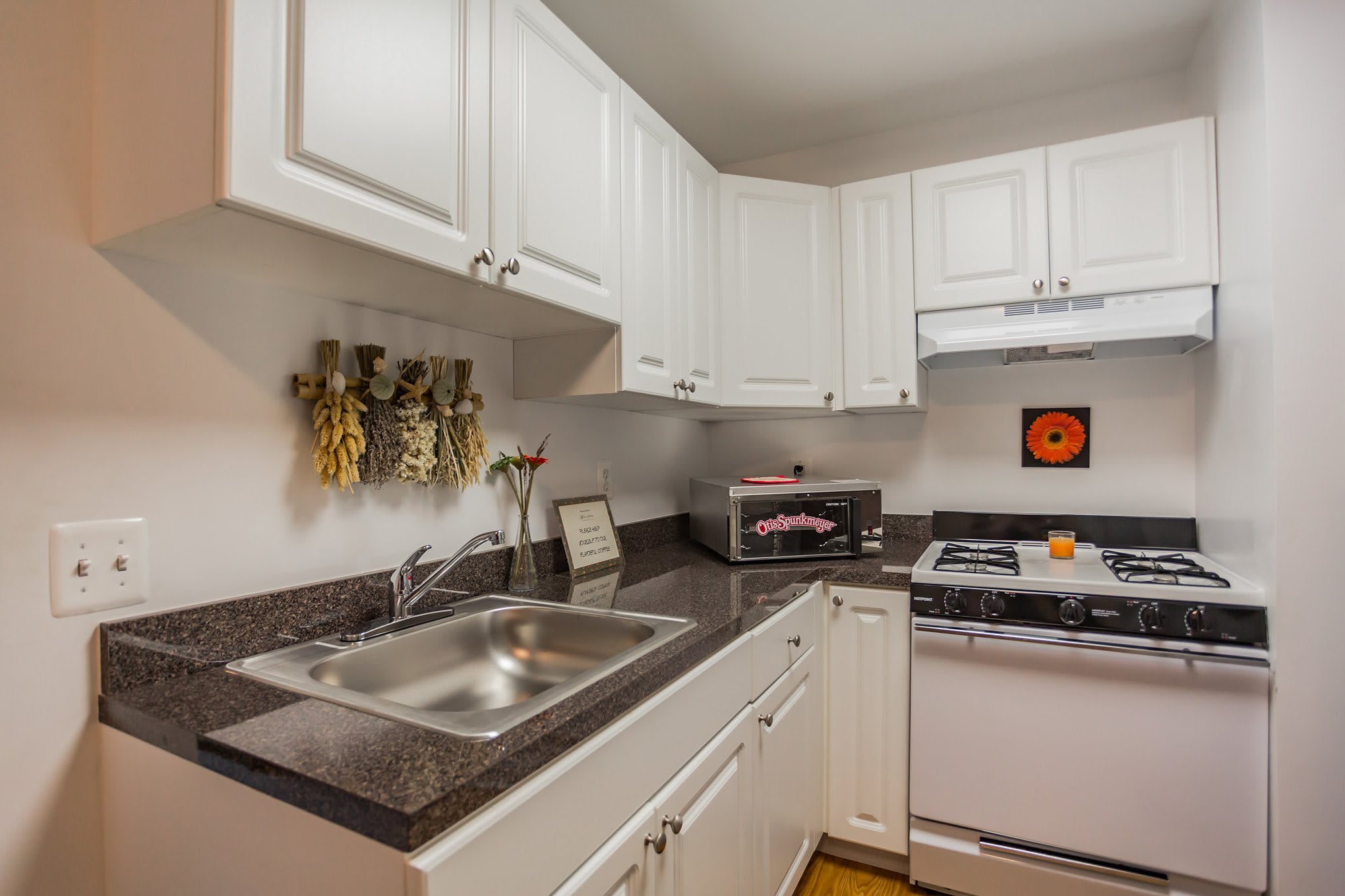 Granite style counter tops in a kitchen at Melrose Station Apartments in Elkins Park, Pennsylvania