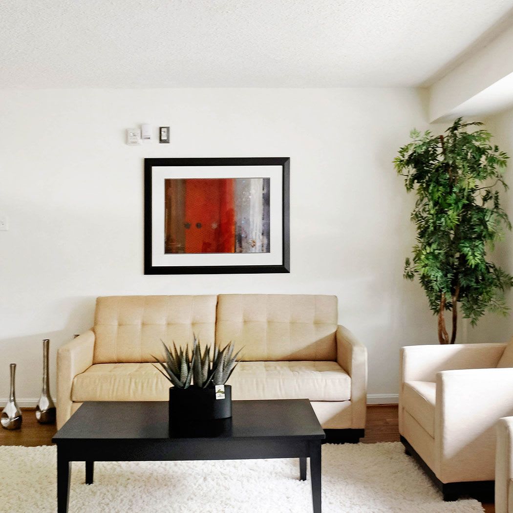 Modern living room with couch an coffee table at Arbor View