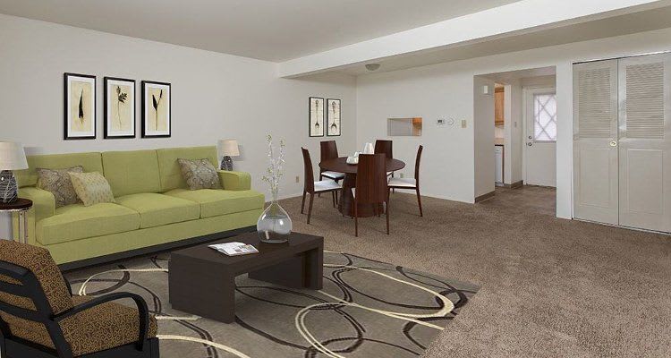 Spacious living room at High Acres Apartments and Townhomes home in Syracuse, NY