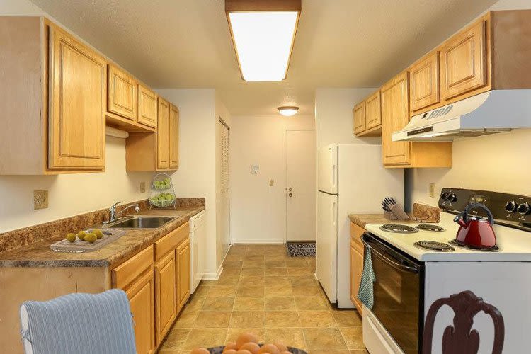 Well-equipped kitchen at Henrietta Highlands in Henrietta, New York