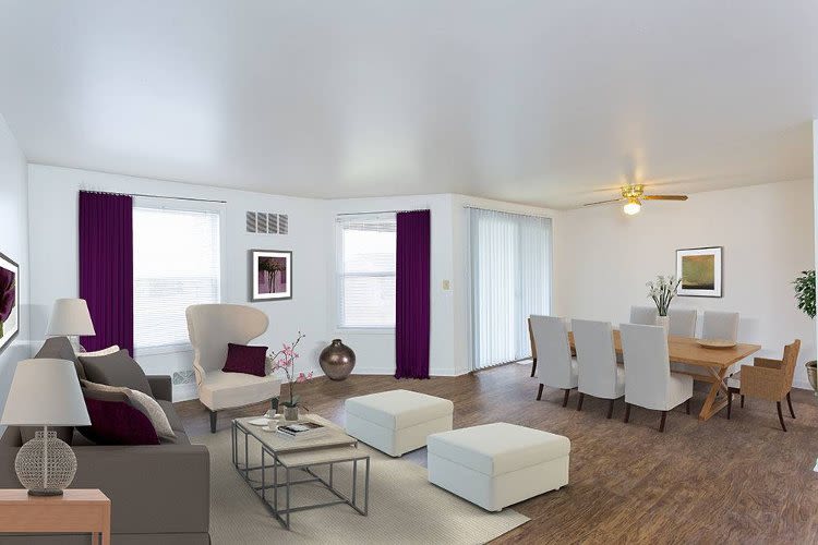 Spacious living room at Riverton Knolls home in West Henrietta, NY
