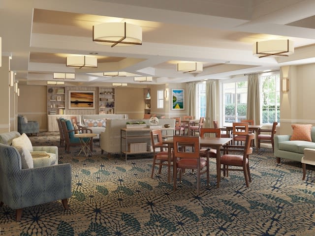 Resident and aid spending time together at the senior living community in Mercer Island