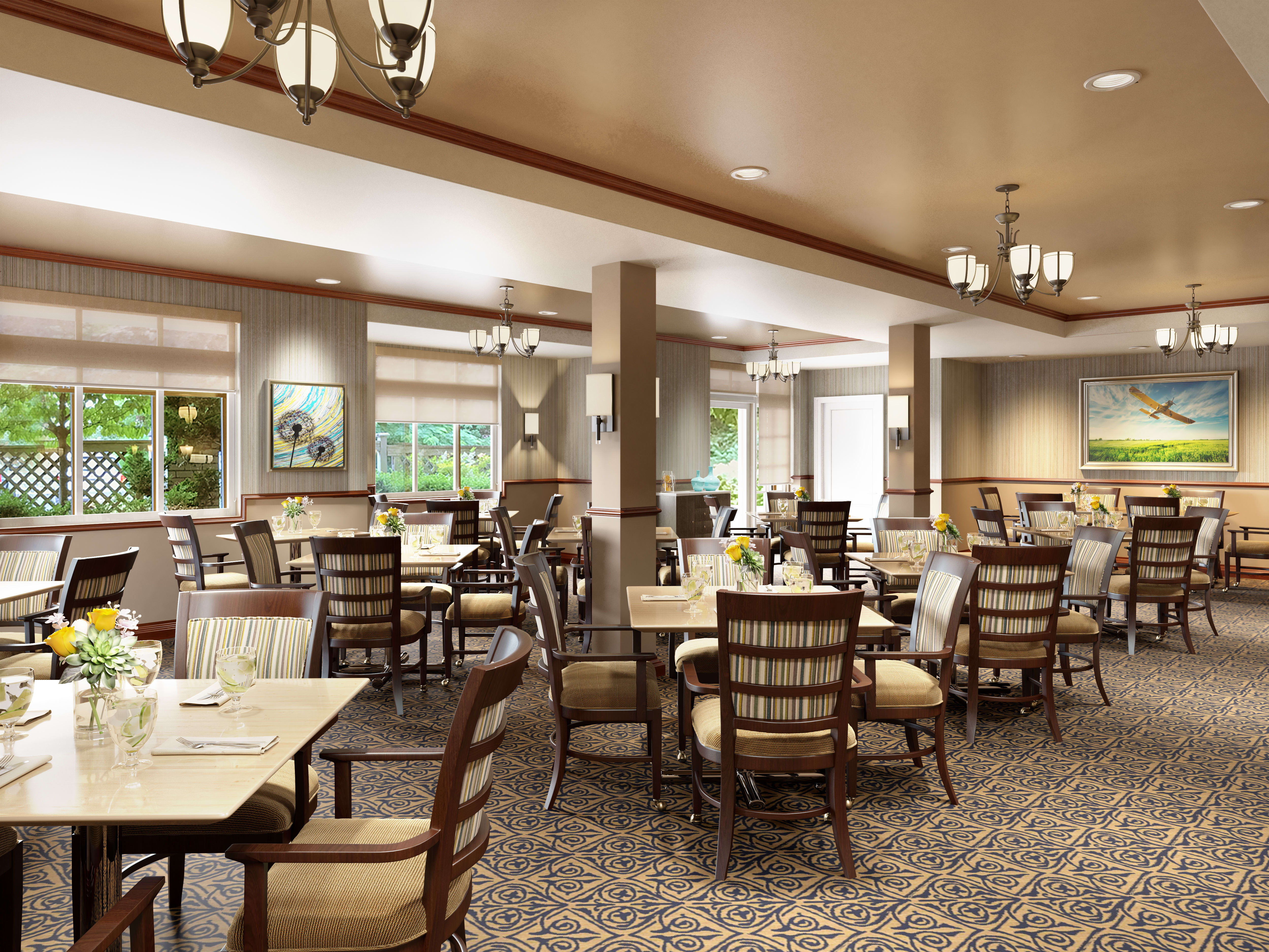 Resident and aid spending time together at the senior living community in Woodinville