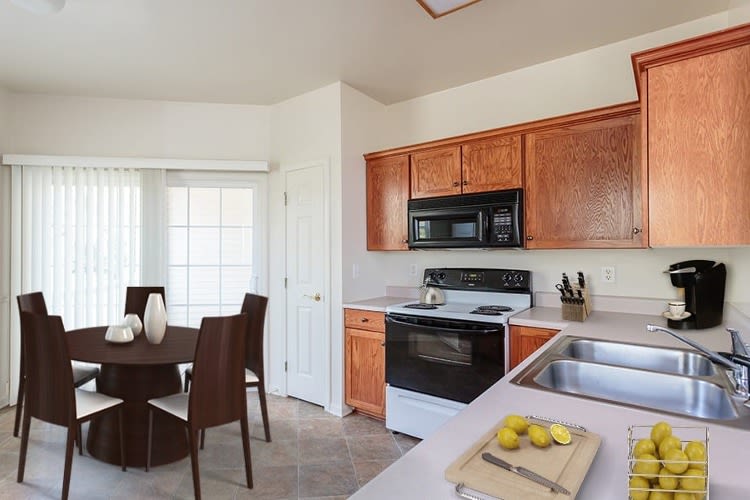 Dining room and kitchen at Webster Green in Webster, New York