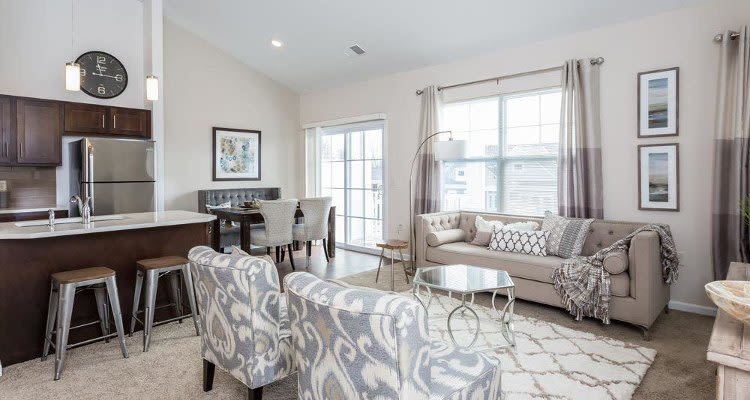 Beautifully designed living room at Union Square Apartments in North Chili, New York