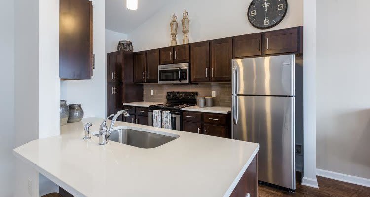 Modern kitchen at Union Square Apartments in North Chili, New York