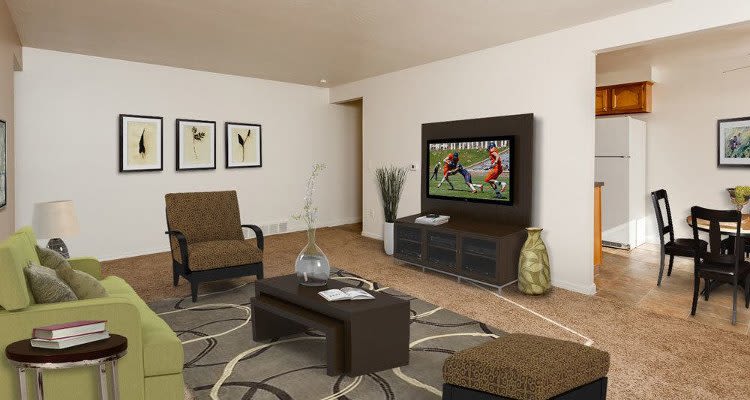 Spacious living room at East Ridge Manor Apartments in Rochester, NY