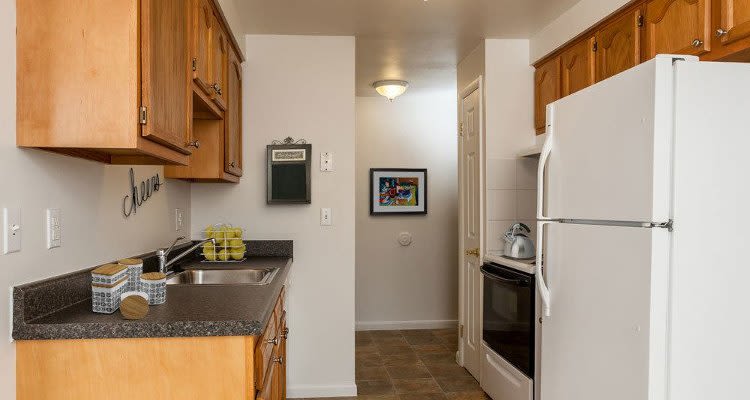 Fully-equipped kitchen at East Ridge Manor Apartments in Rochester