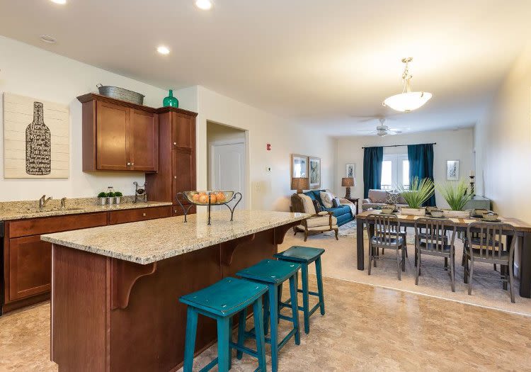 Our apartments in Rochester, New York showcase a beautiful kitchen and breakfast bar