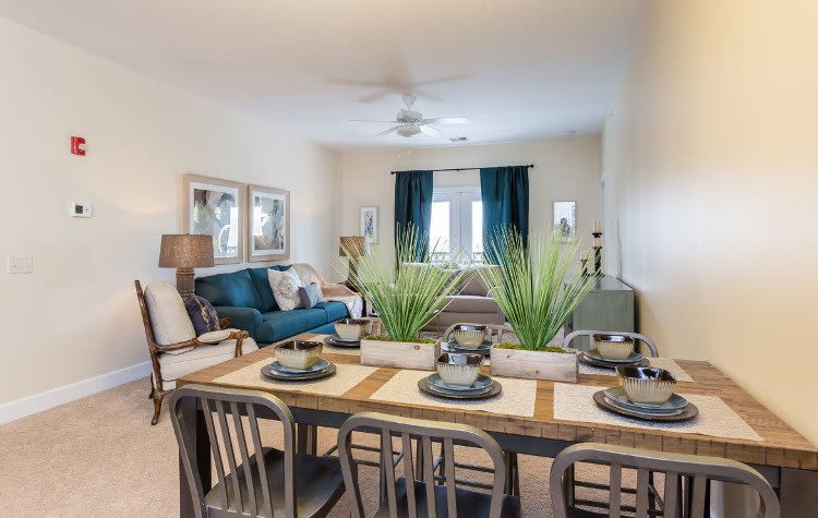 Elegant dining room and spacious living room at Gateway Landing on the Canal