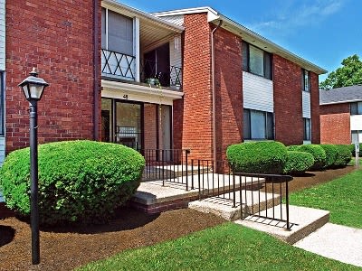 Exterior view of apartments at King's Court Manor Apartments in Rochester, NY