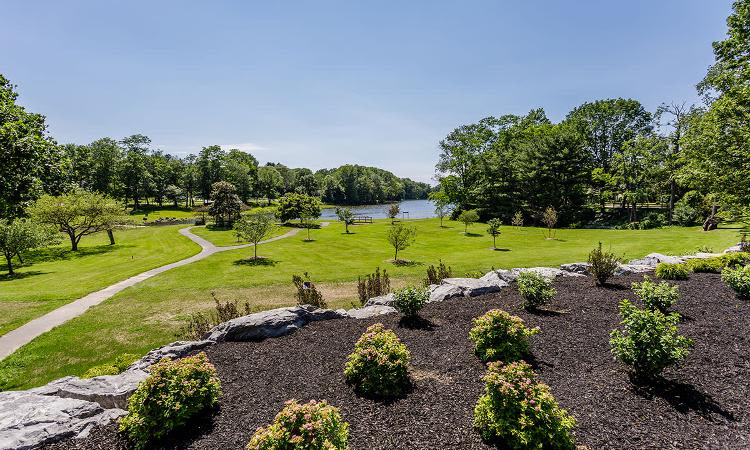 Beautiful landscaping at Green Lake Apartments & Townhomes in Orchard Park, New York