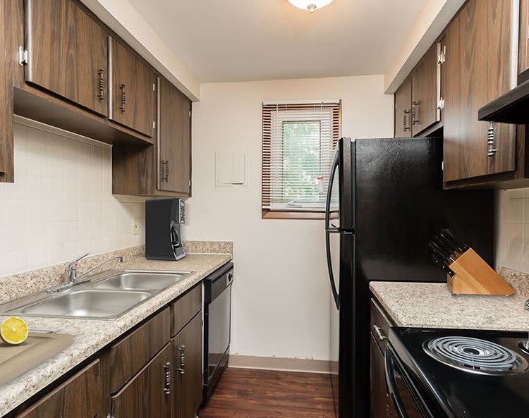 Well-equipped kitchen at Paradise Lane Apartments home in Tonawanda, NY