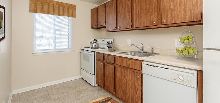 Well-equipped kitchen at Willowbrooke Apartments and Townhomes home