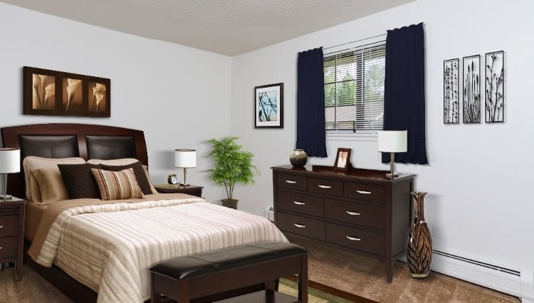 Well decorated bedroom at Creek Hill Apartments & White Oak Apartments home in Webster