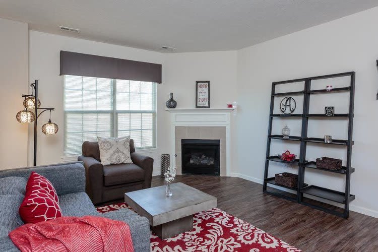 Luxury living room at Auburn Creek Apartments home in Victor, NY