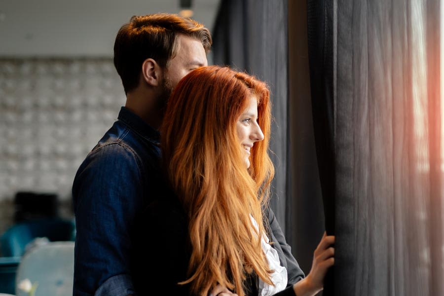 Couple enjoying the view from their Berkshire property