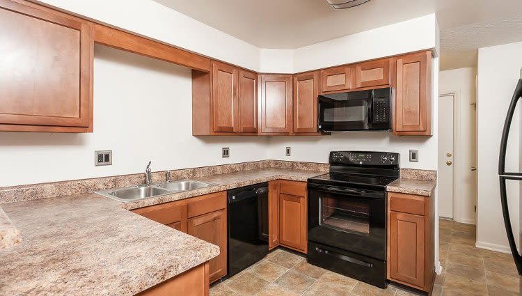 Modern kitchen at CenterPointe Apartments and Townhomes home