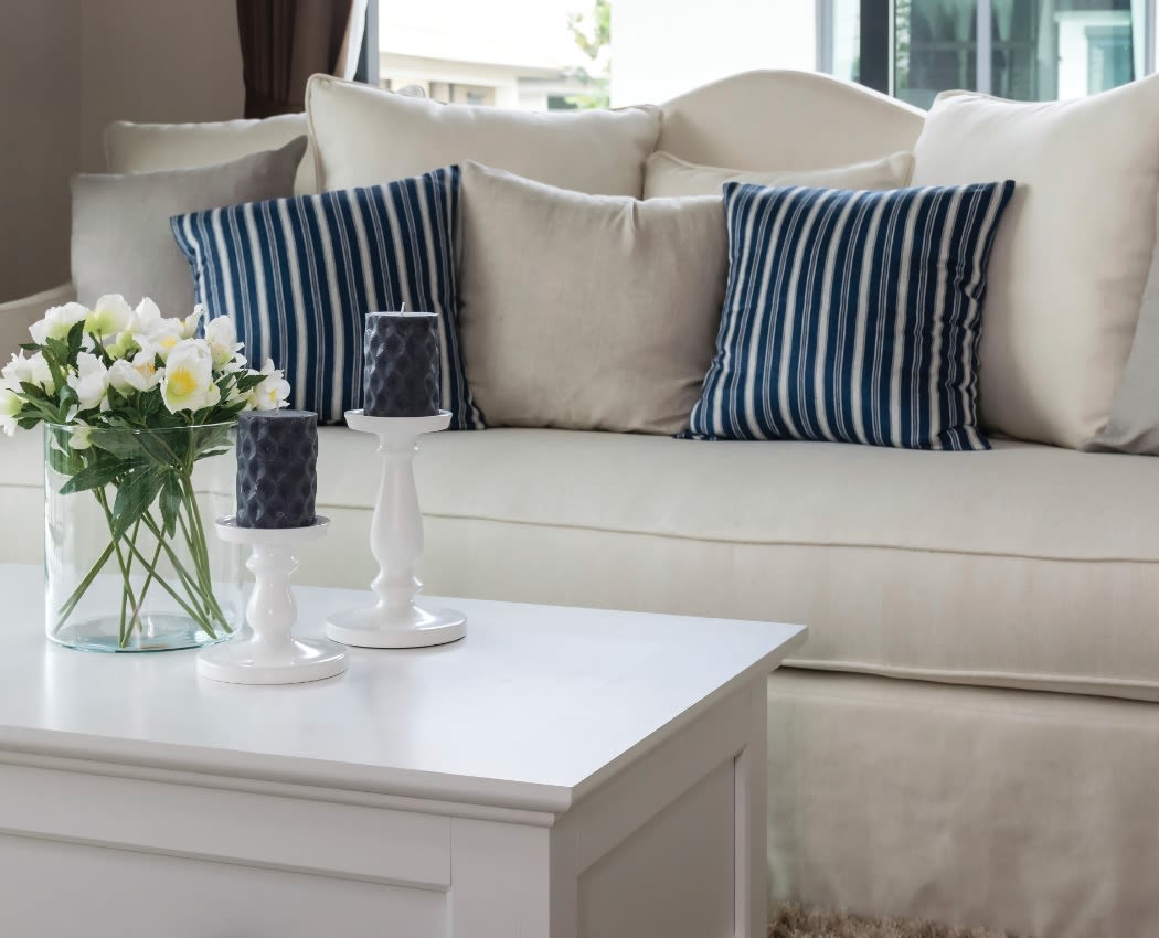 Comfy couch at Penfield Village Apartments
