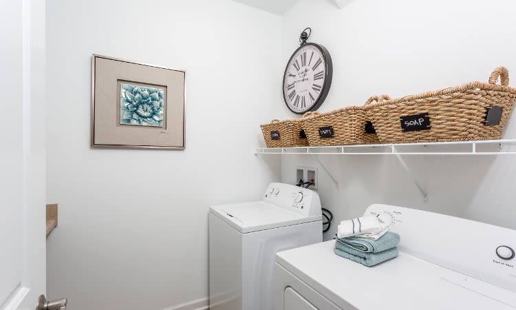 Enjoy apartments at The Links at CenterPointe Townhomes with a washer and dryer