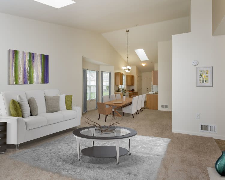 Cozy living room at Villas of Victor and Regency Townhomes in Victor, NY