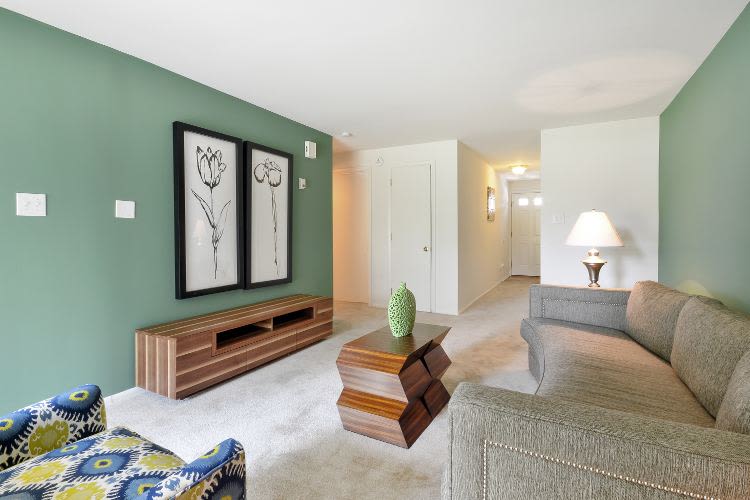Mapleton Square Apartment Homes offers a living room in Dover, DE