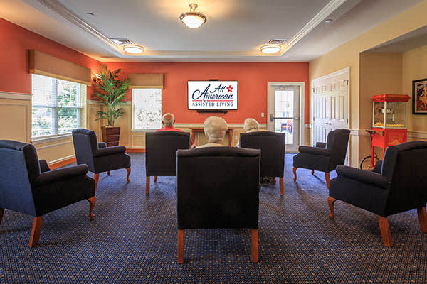 Take in a movie with friends at All American Assisted Living at Washington Township