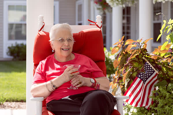Happy woman outside on a sunny day at All American Assisted Living at Washington Township