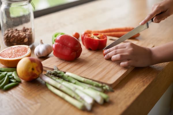 Preparing a meal at Richmond Hill Apartments in Richmond Hill