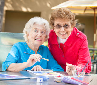 Independent Living residents painting at Emerald Court