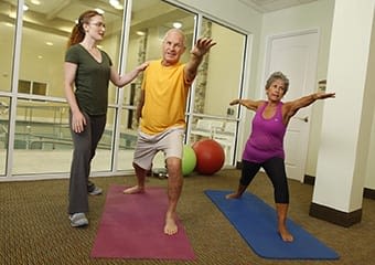 Residents doing pilates at Discovery Commons At Wildewood in California, Maryland