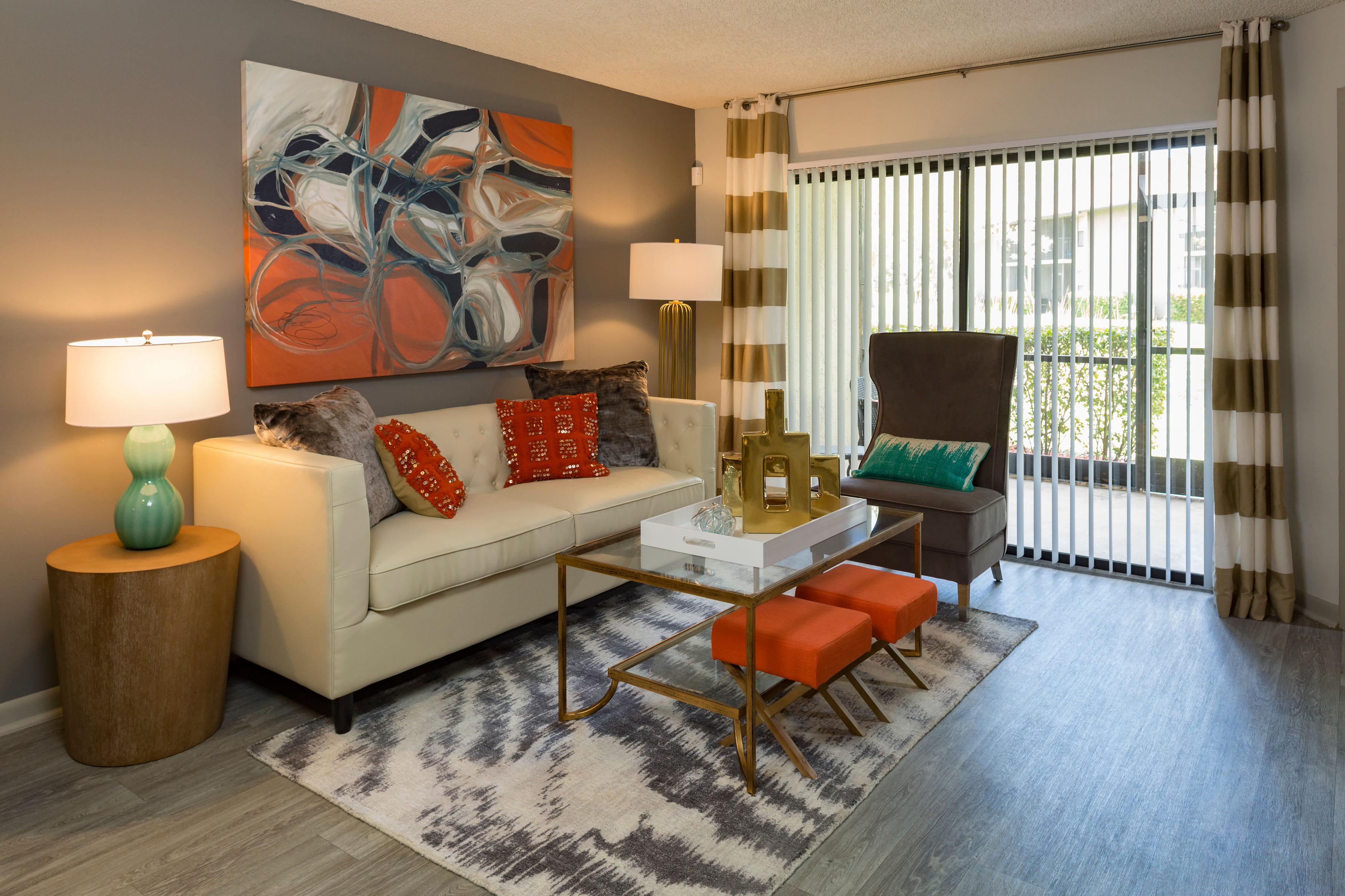 Modern decor in open-concept living area in model home at Siena Apartments in Plantation, Florida
